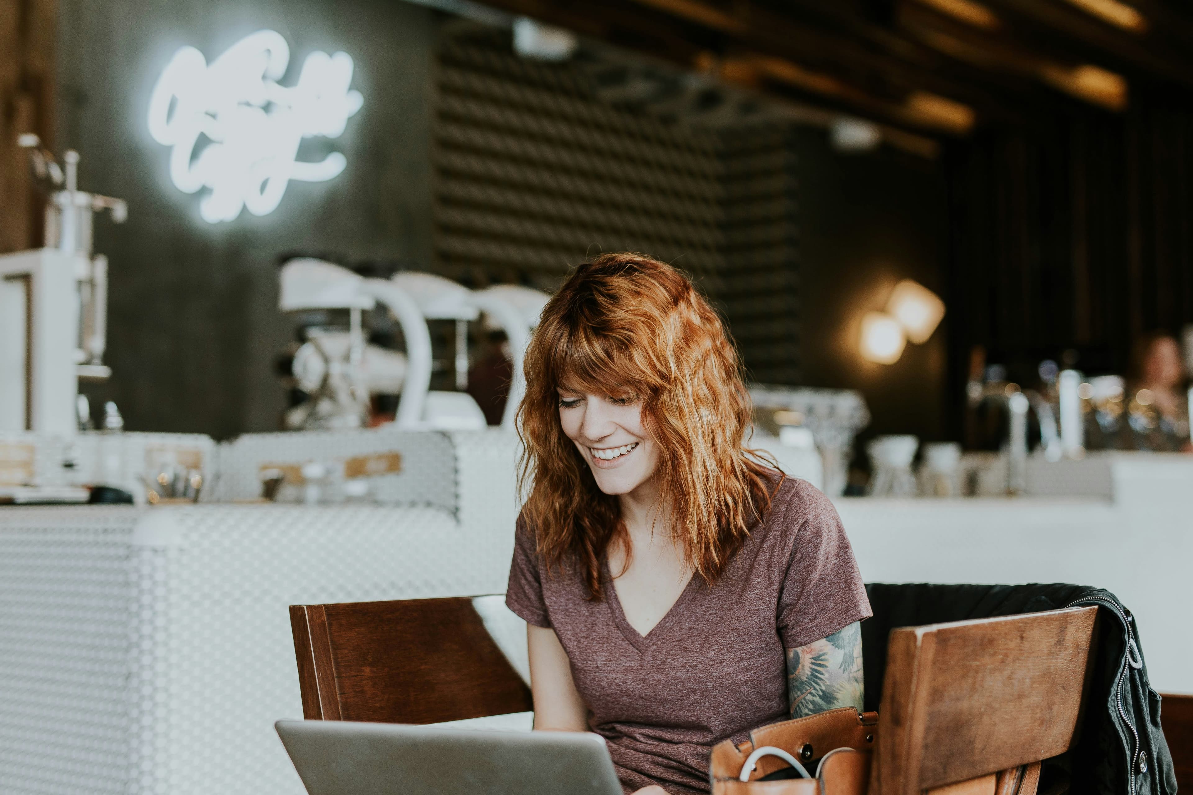 A small business owner working on her website